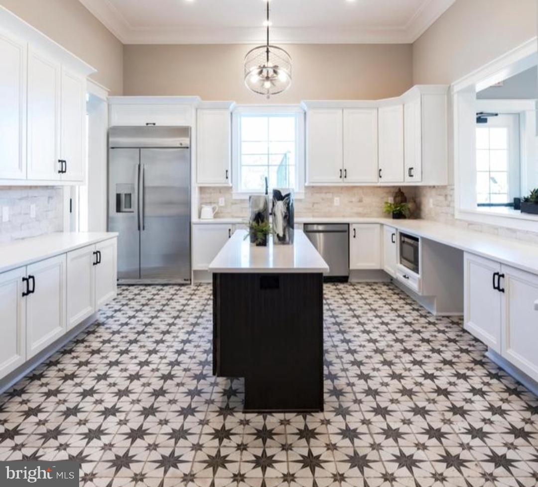 40 Emerald Road Wrightstown, NJ 08562 - Photo 36 of 39 Stylish kitchen with striking tile design.