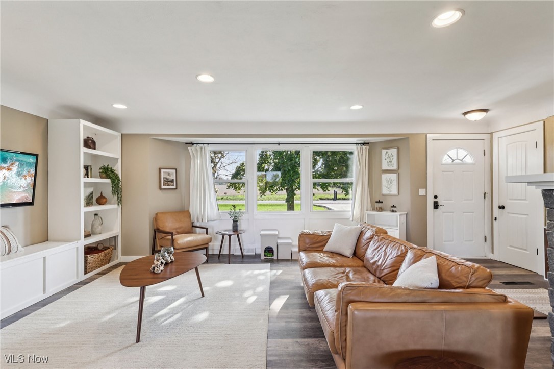 6147 Stone Road Medina, OH 44256 - Photo 2 of 40 Living area featuring recessed lighting and dark wood-type flooring