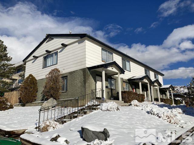 3240 Gypsum Road Reno, NV 89503 - Photo 2 of 14 a backyard of a house with table and chairs
