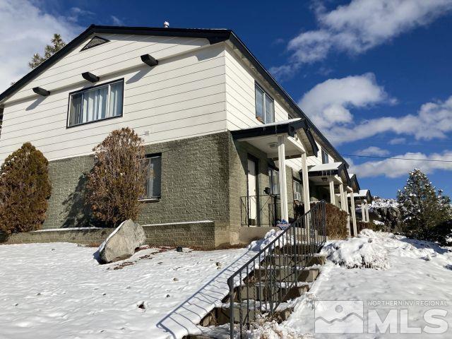 3240 Gypsum Road Reno, NV 89503 - Photo 3 of 14 a view of a house with snow on the road
