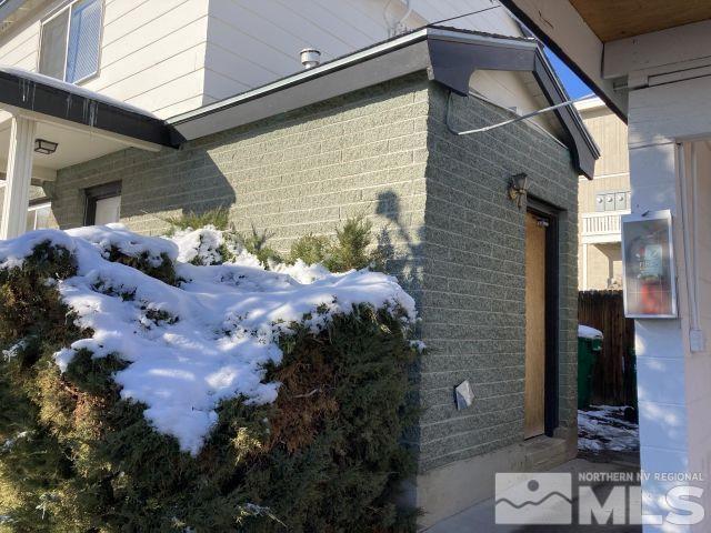 3240 Gypsum Road Reno, NV 89503 - Photo 5 of 14 a front view of a house with a yard