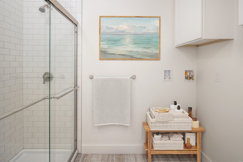 8 Channel Street Mattapoisett, MA 02739 - Photo 26 of 39 a bathroom with a shower toilet and sink