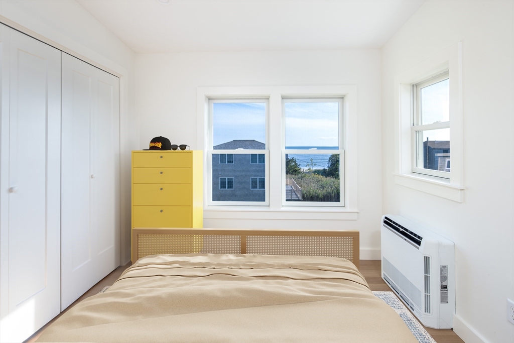 8 Channel Street Mattapoisett, MA 02739 - Photo 27 of 39 a bedroom with a bed and a window