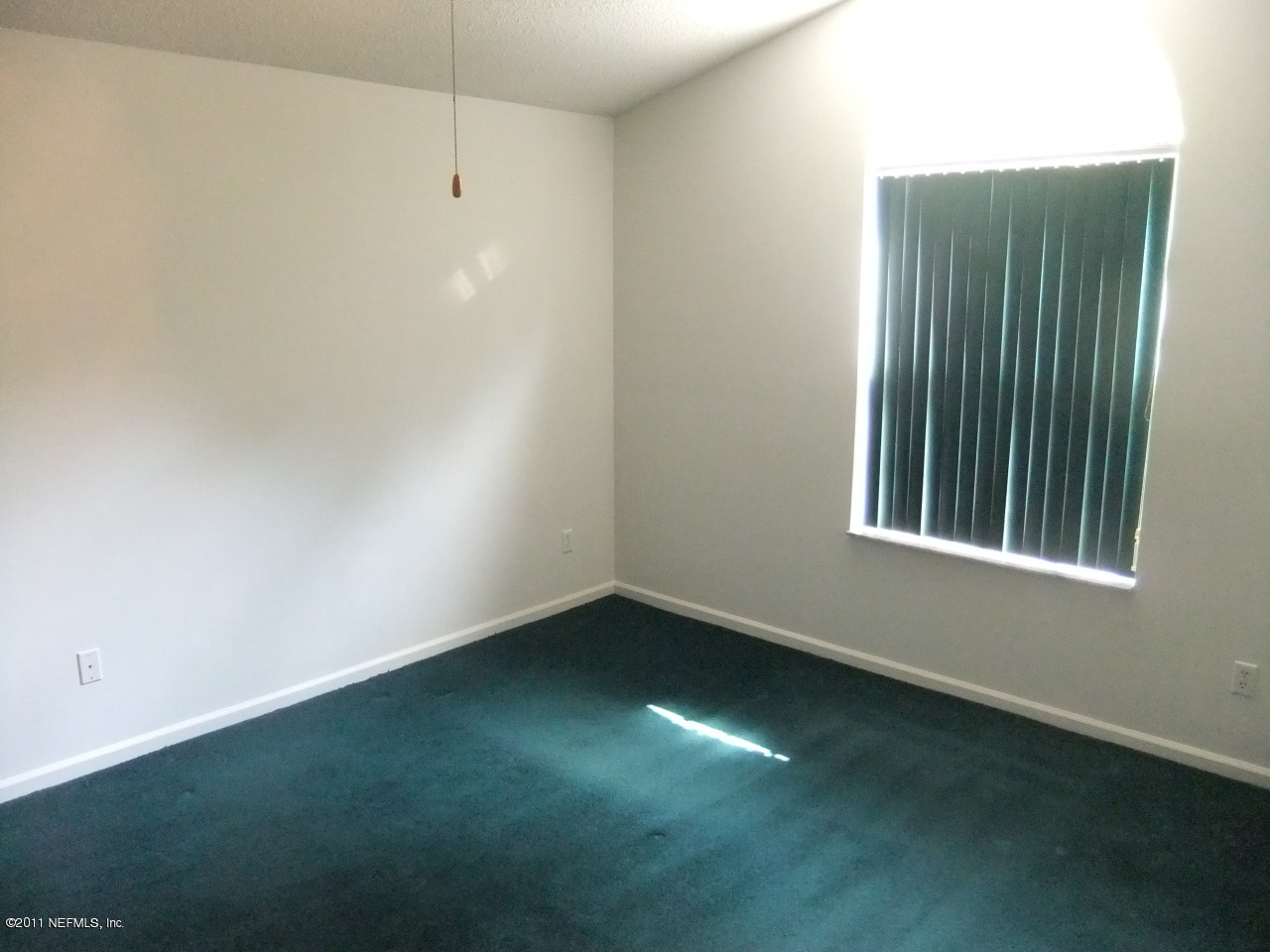56101 Griffin Road Callahan, FL 32011 - Photo 12 of 18 an empty room with a window
