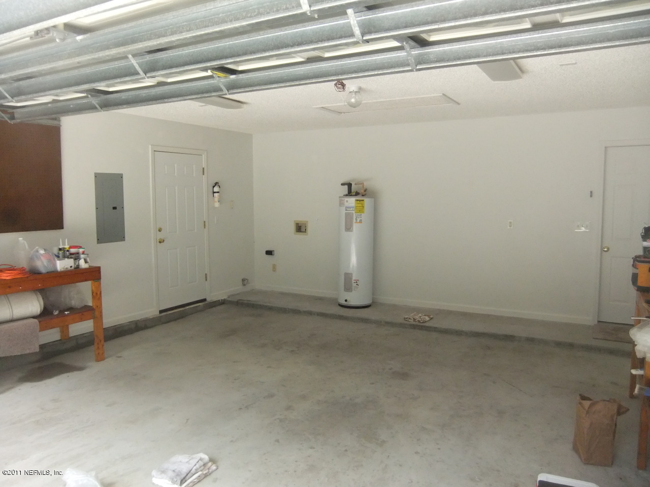56101 Griffin Road Callahan, FL 32011 - Photo 8 of 18 a view of a room with rack on the wall