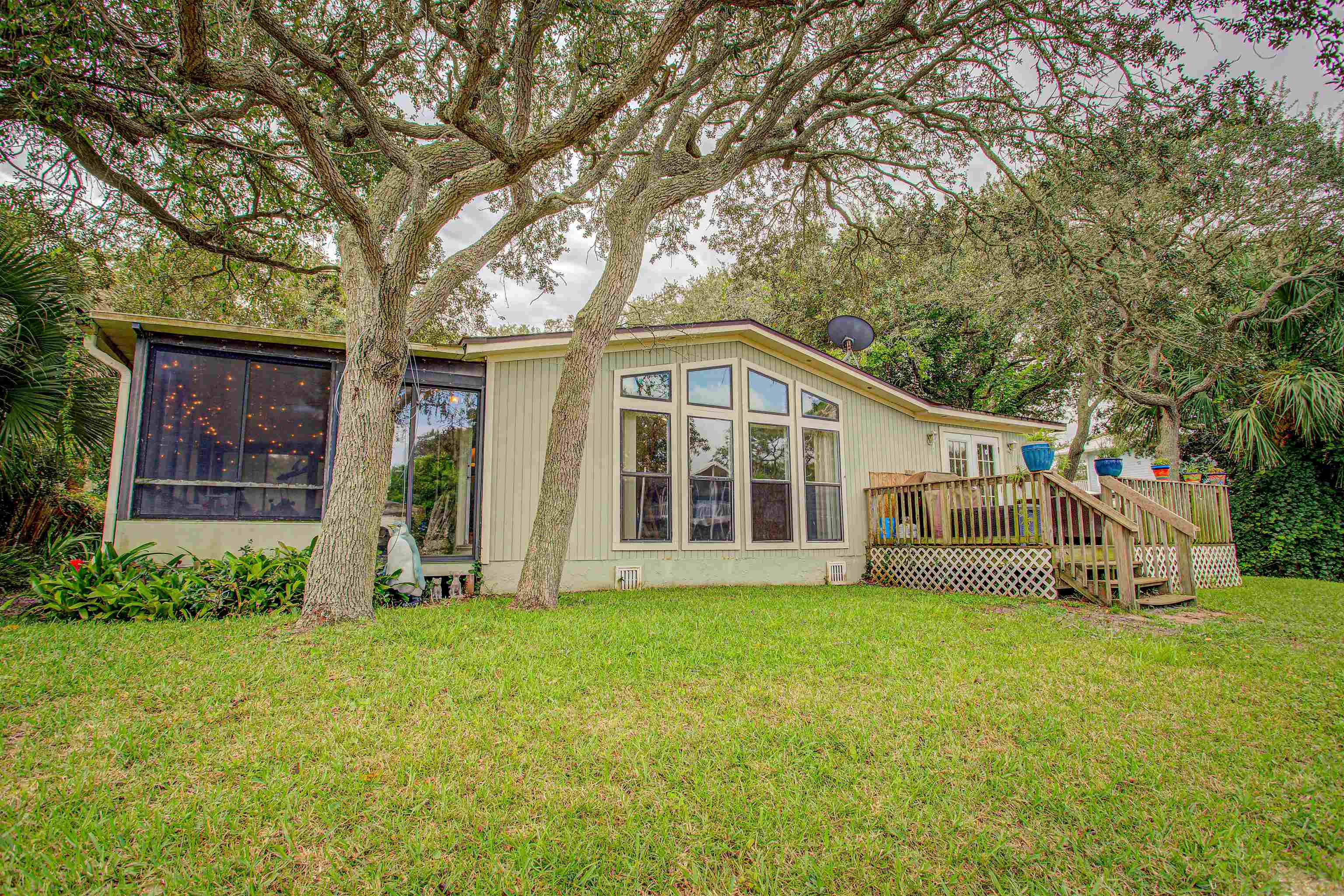 224 Puebla Road St. Augustine, FL 32080 - Photo 17 of 32 a view of a house with a yard