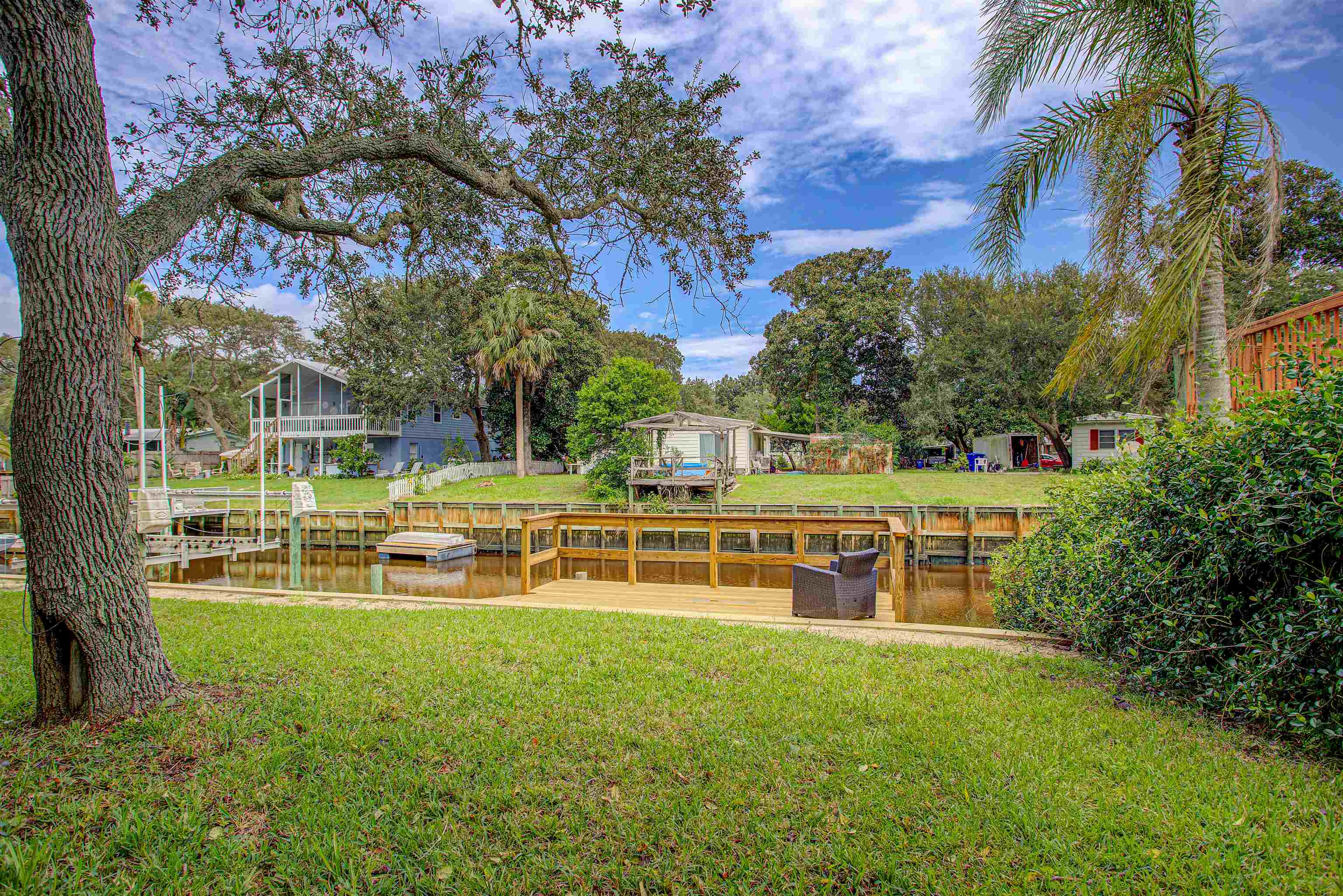 224 Puebla Road St. Augustine, FL 32080 - Photo 18 of 32 an aerial view of a house with swimming pool garden and trees