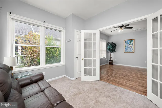 a view of livingroom with furniture and windows