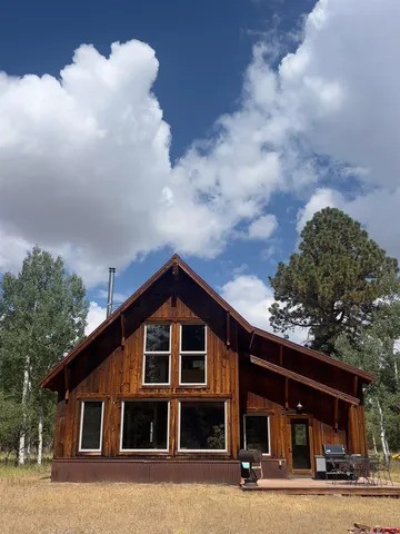 a view of a city with green space