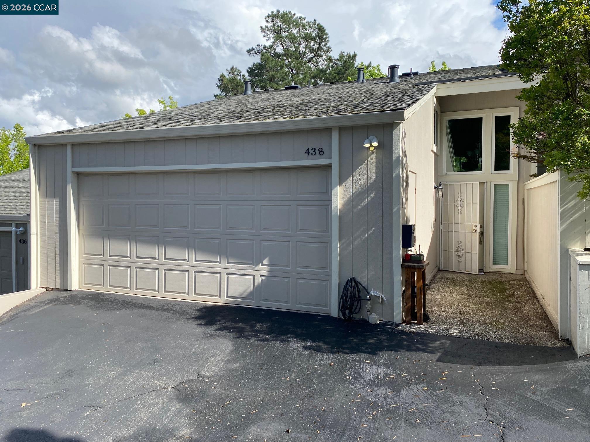 438 Ridgeview Drive Pleasant Hill, CA 94523 - Photo 2 of 12 a view of a house with a garage