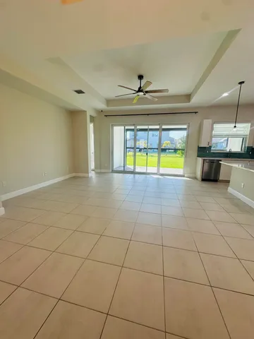 a view of an empty room and window