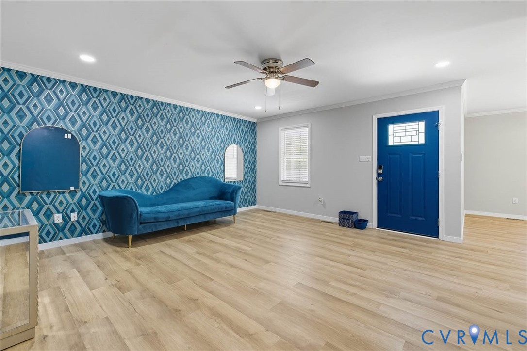 1005 West Main Street Waverly, VA 23890 - Photo 12 of 32 a bedroom with a bed and a couch