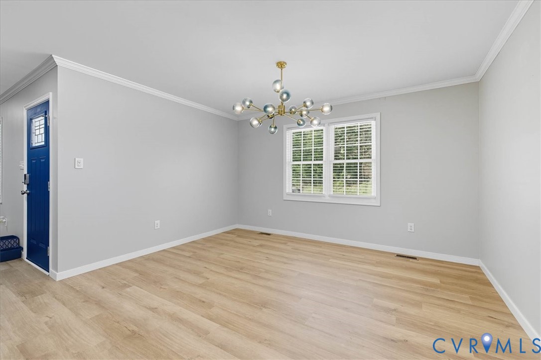 1005 West Main Street Waverly, VA 23890 - Photo 14 of 32 a view of an empty room with a window
