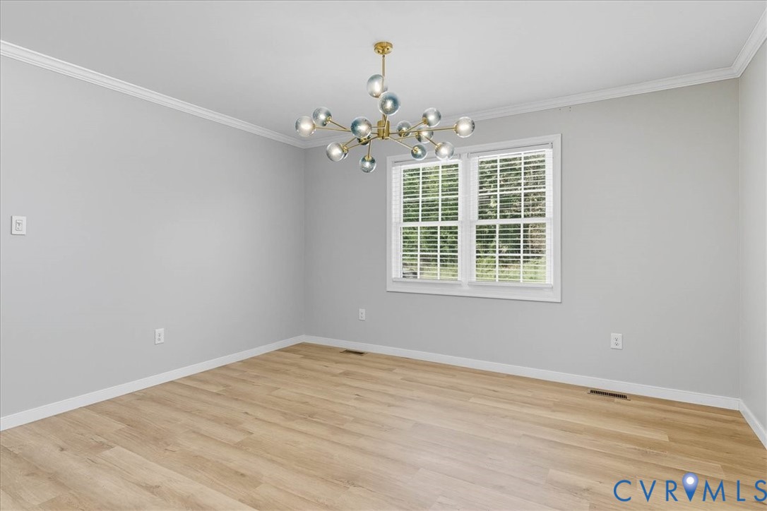 1005 West Main Street Waverly, VA 23890 - Photo 15 of 32 a view of an empty room with a window