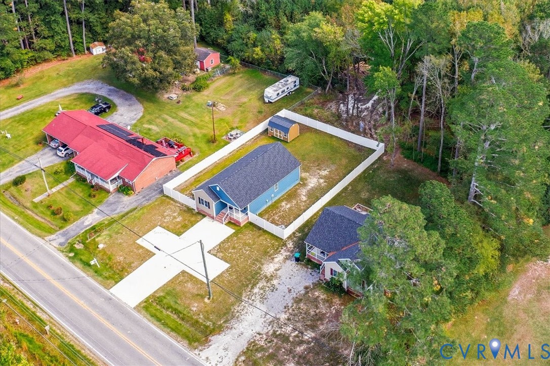 1005 West Main Street Waverly, VA 23890 - Photo 2 of 32 an aerial view of a house swimming pool and outdoor space