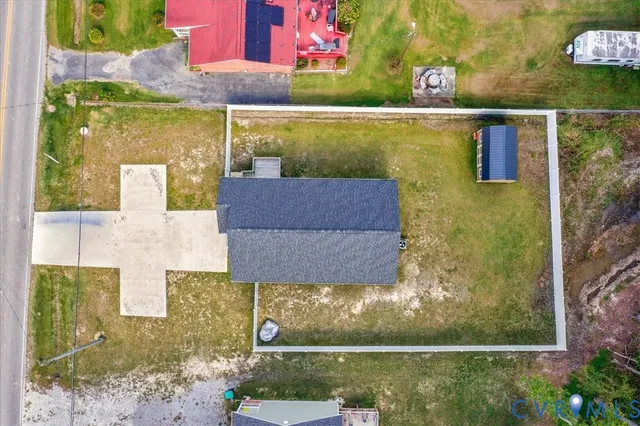 a view of swimming pool with a yard
