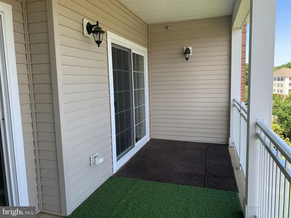 a view of a door and a window
