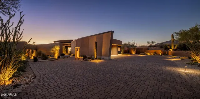 a backyard of a house with seating space