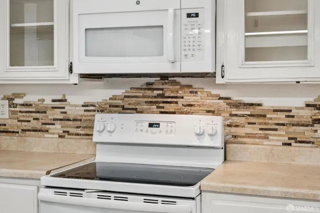 a view of kitchen with stove
