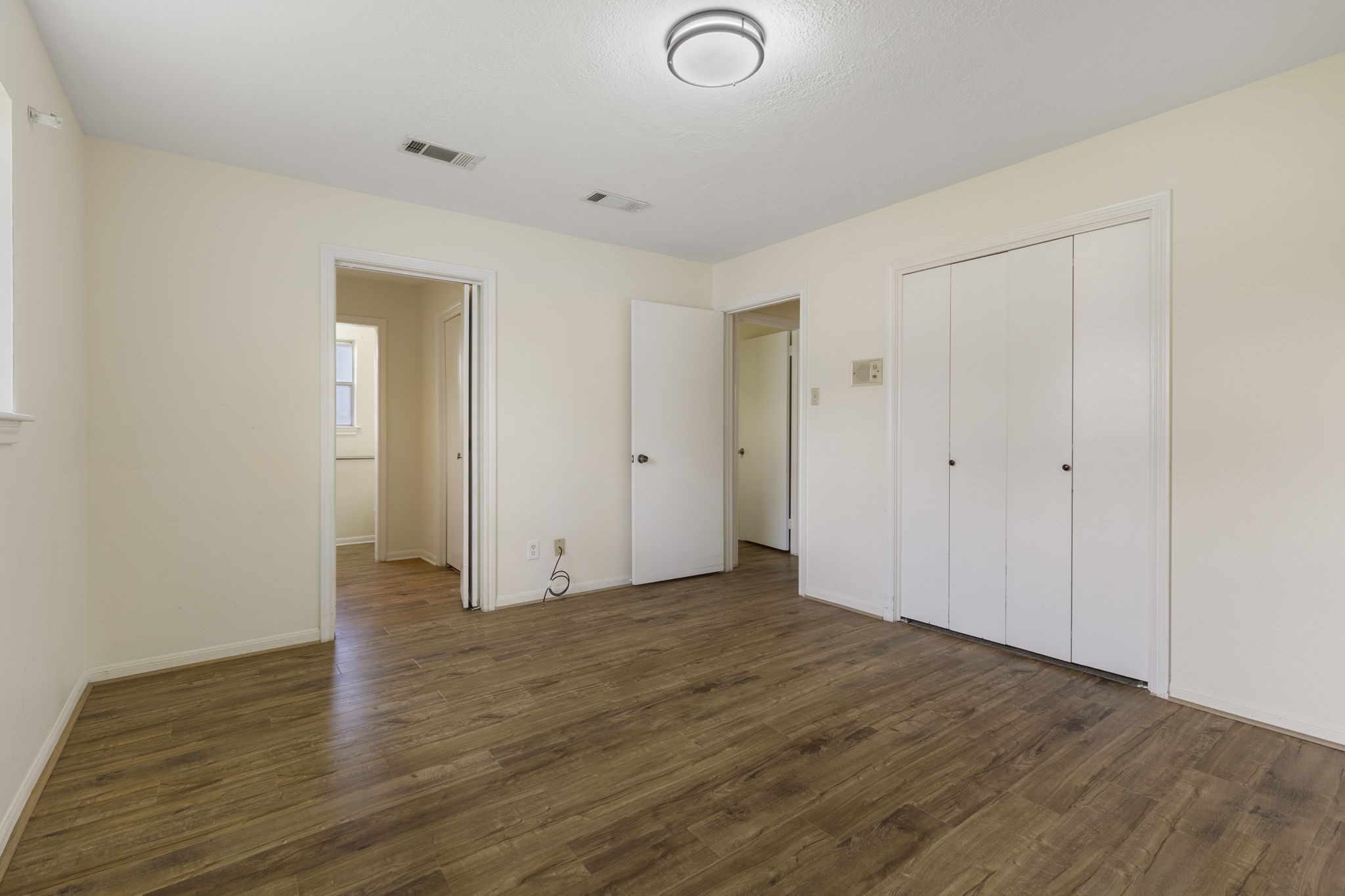 519 Kathy Street Humble, TX 77338 - Photo 13 of 21 LVT flooring in primary bedroom was installed in 2022