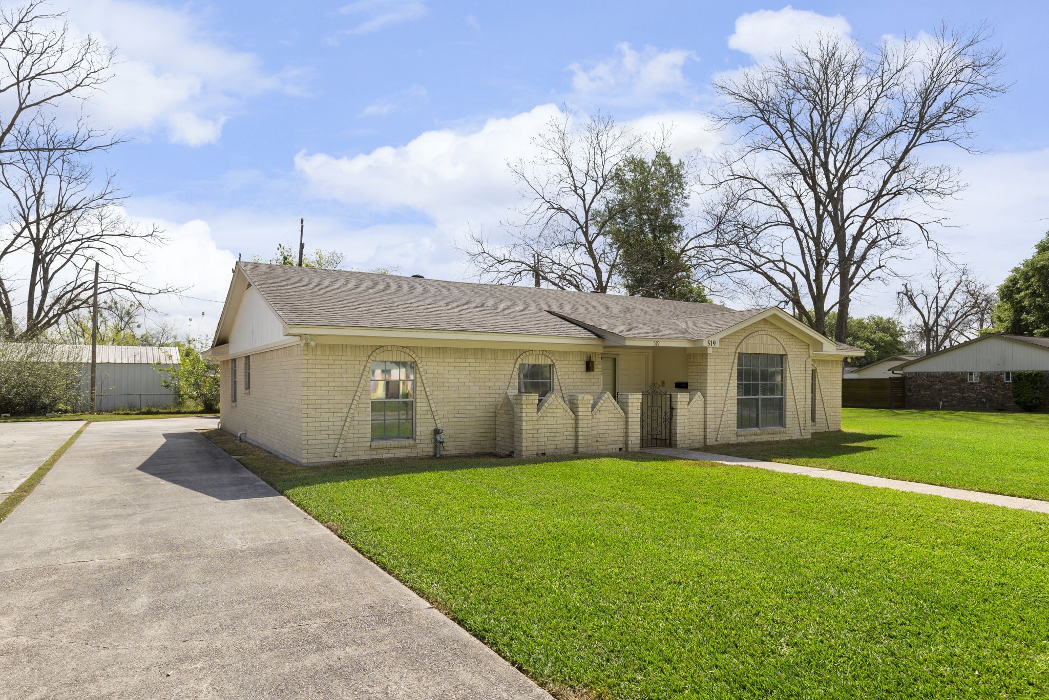 519 Kathy Street Humble, TX 77338 - Photo 2 of 21 The long driveway leads to the two car garage.