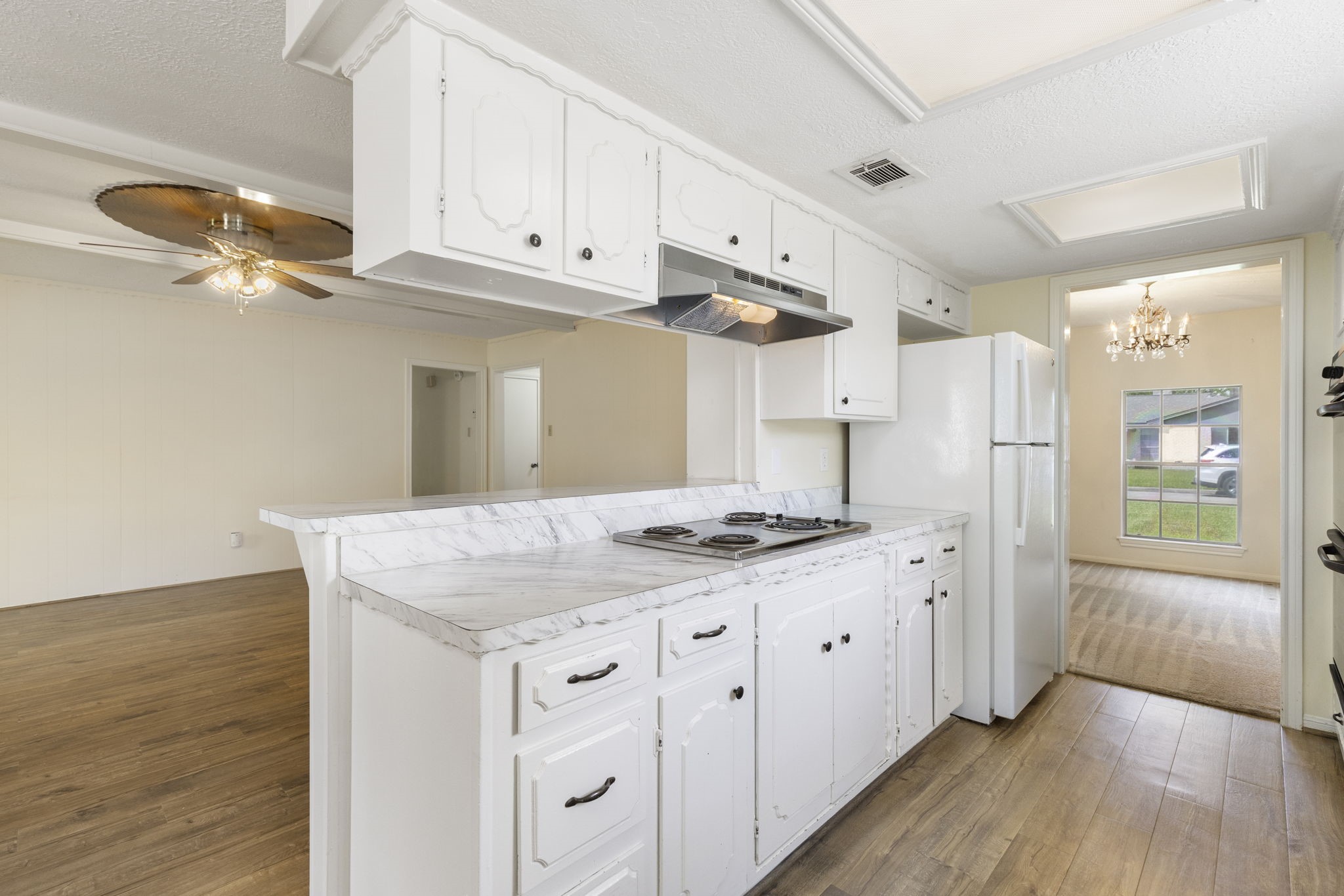 519 Kathy Street Humble, TX 77338 - Photo 6 of 21 Abundant cabinetry and counter space in the kitchen.