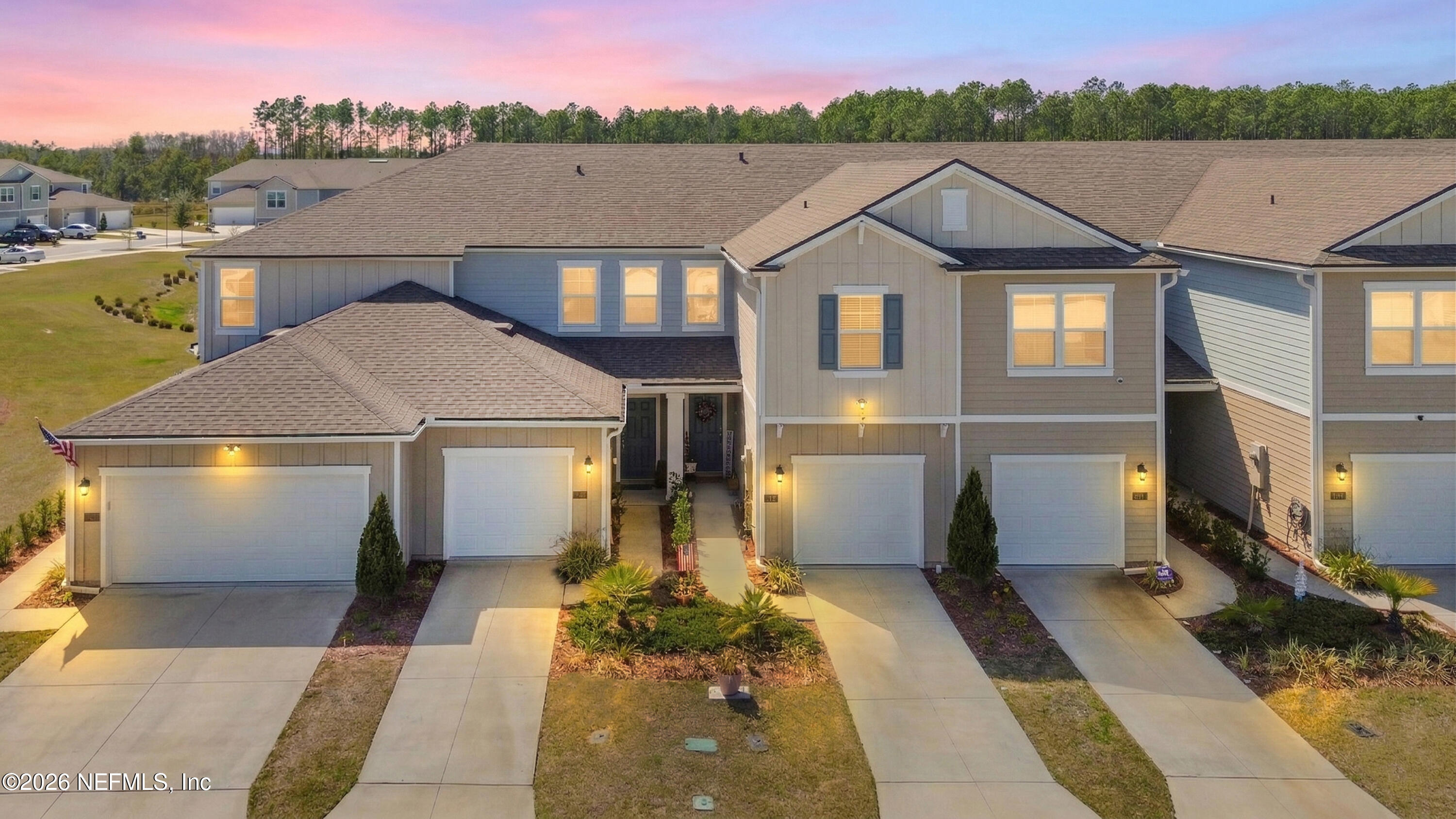 a aerial view of a house with a yard