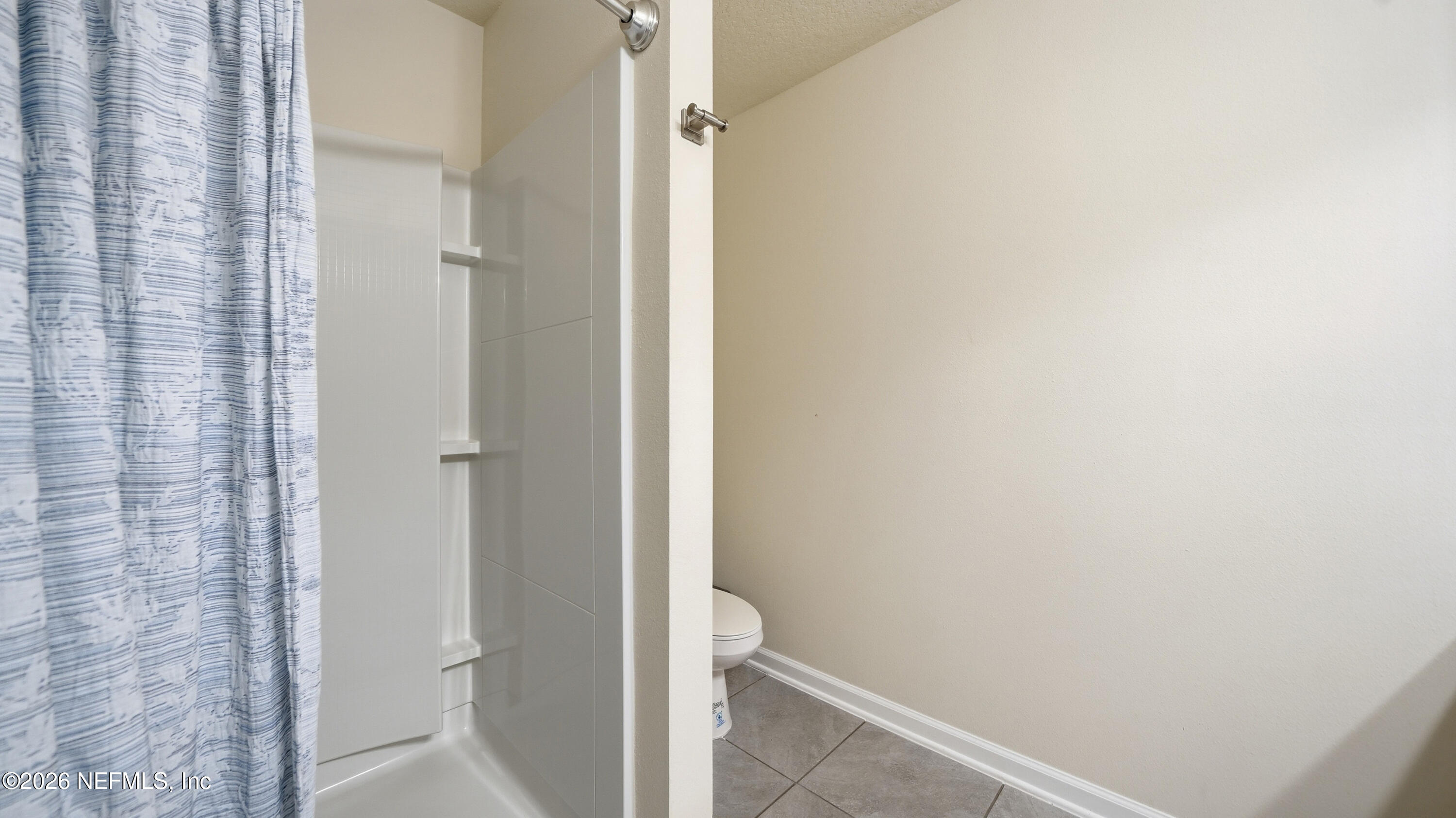 172 Redbud Road Palm Coast, FL 32137 - Photo 23 of 43 a bathroom with a granite countertop shower