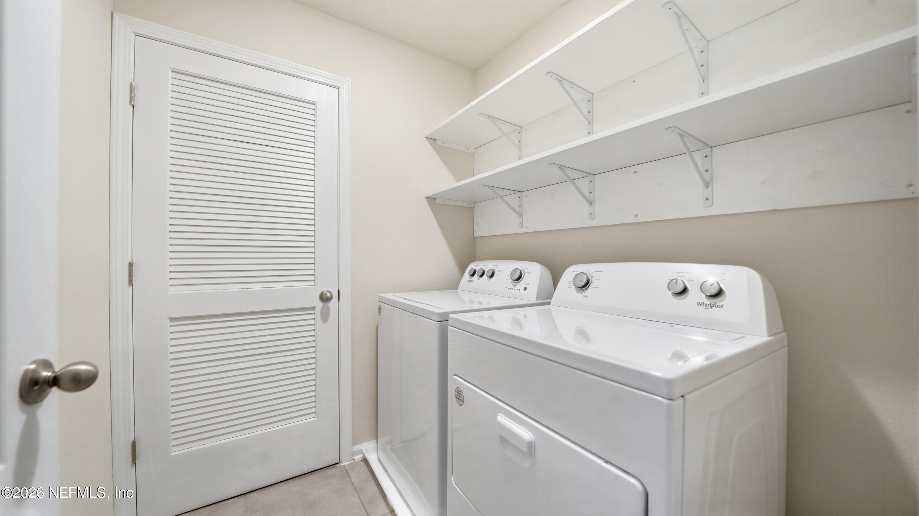 172 Redbud Road Palm Coast, FL 32137 - Photo 30 of 43 a utility room with dryer and washer