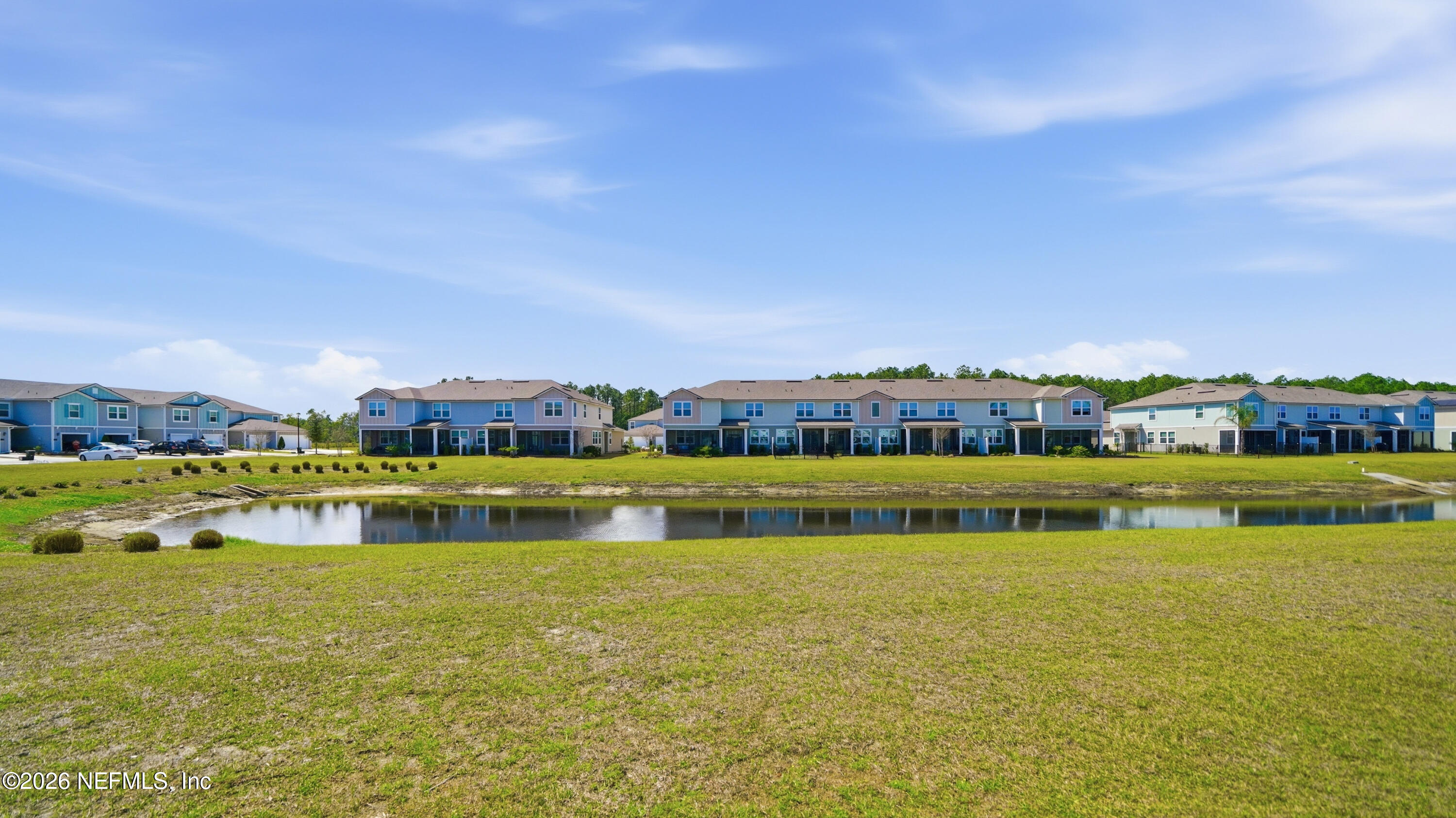172 Redbud Road Palm Coast, FL 32137 - Photo 31 of 43 a view of an ocean with a building in the background