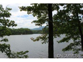 Lot 3 Mountain Pkwy Mill Spring Mill Spring, NC 28756 - Photo 6 of 11 a view of a lake with mountain