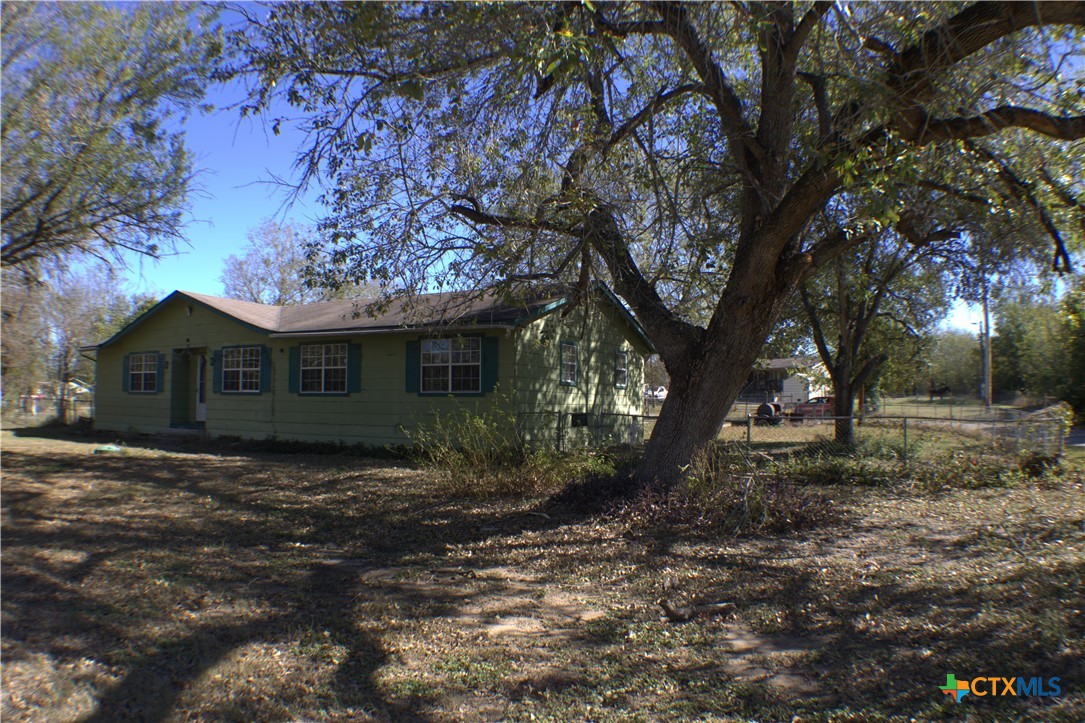 206 Meadowbrook Street Dale, TX 78616 - Photo 2 of 10 a view of a house with a yard