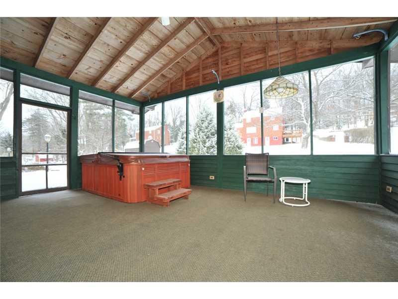 131 Tyler Road Pittsburgh, PA 15237 - Photo 16 of 22 Sunroom. Sun room has newer slate look ceramic tile flooring under carpeting. Hot tub stays.