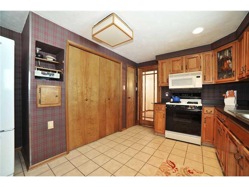 131 Tyler Road Pittsburgh, PA 15237 - Photo 10 of 22 Kitchen. The wallpaper has been removed in the kitchen