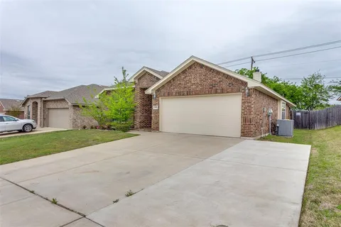a house view with a garden space