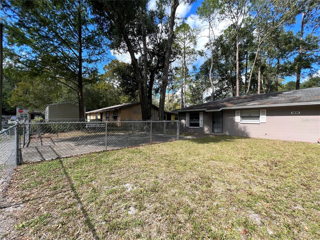 6216 Southwest 10th Place, Unit B Gainesville, FL 32607 - Photo 23 of 24 a view of swimming pool with chairs