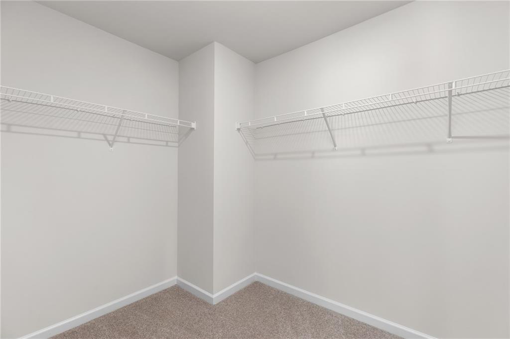 5370 Swan Lane Powder Springs, GA 30127 - Photo 22 of 54 a view of a room with racks on the wall