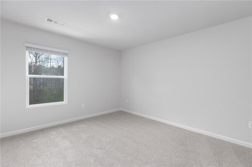 5370 Swan Lane Powder Springs, GA 30127 - Photo 28 of 54 an empty room with a window