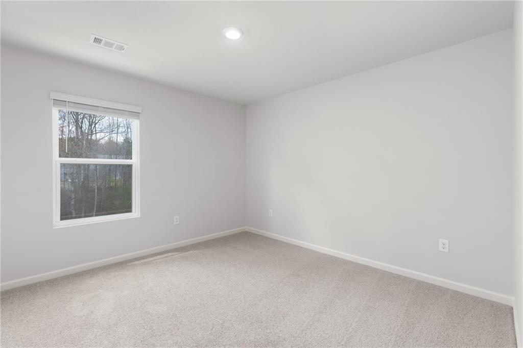 5370 Swan Lane Powder Springs, GA 30127 - Photo 30 of 54 an empty room with a window