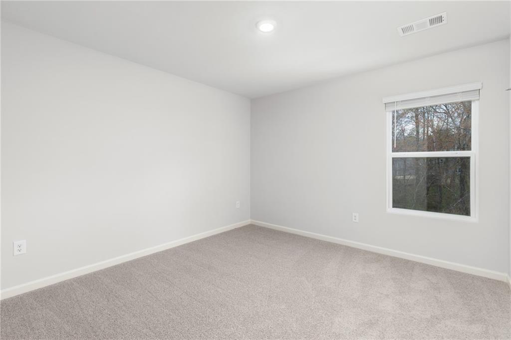 5370 Swan Lane Powder Springs, GA 30127 - Photo 32 of 54 an empty room with a window