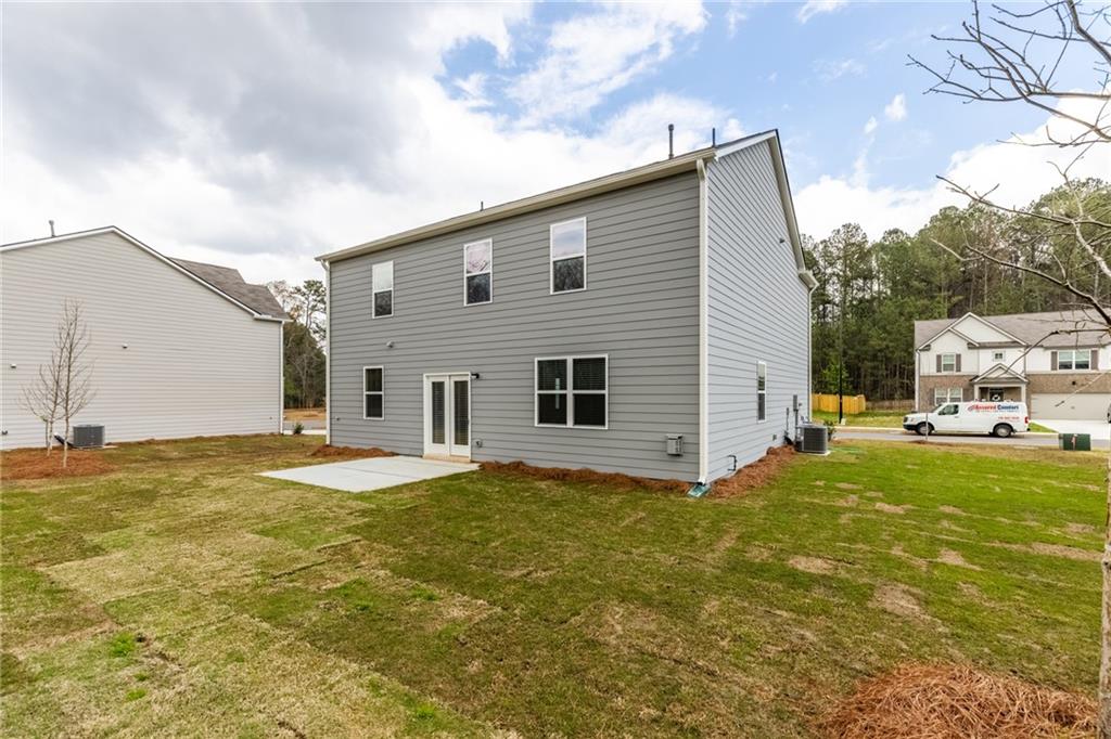 5370 Swan Lane Powder Springs, GA 30127 - Photo 41 of 54 a view of a house with backyard and sitting area