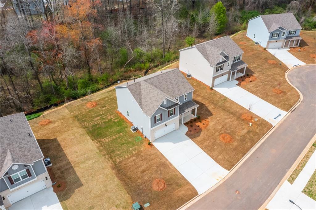 5370 Swan Lane Powder Springs, GA 30127 - Photo 44 of 54 an aerial view of a house with pool