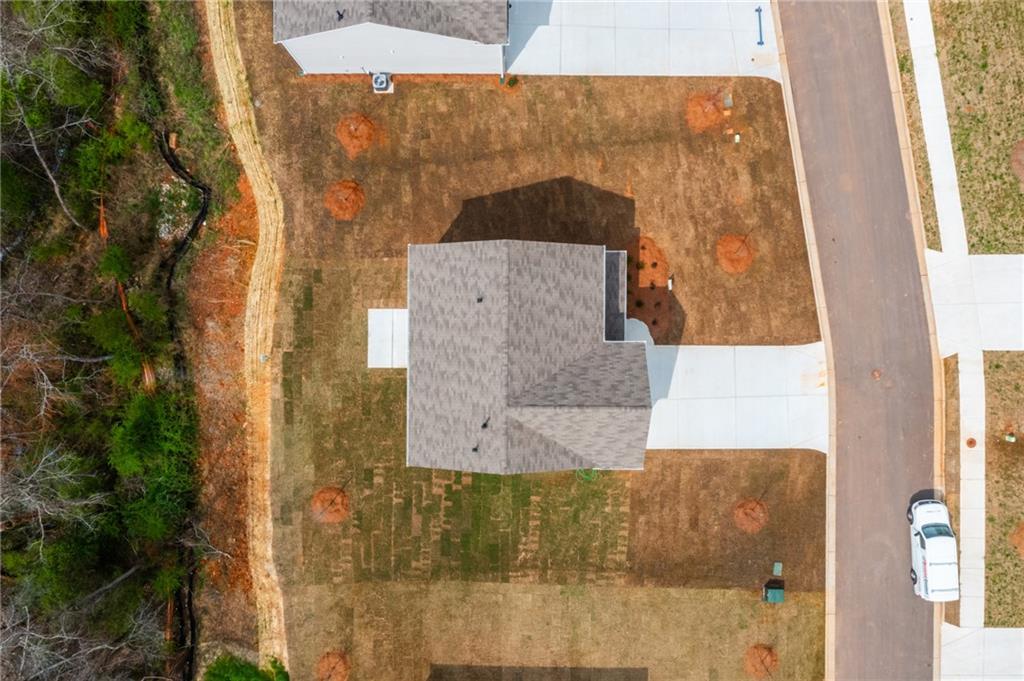 5370 Swan Lane Powder Springs, GA 30127 - Photo 45 of 54 aerial view of a house with a yard and large tree
