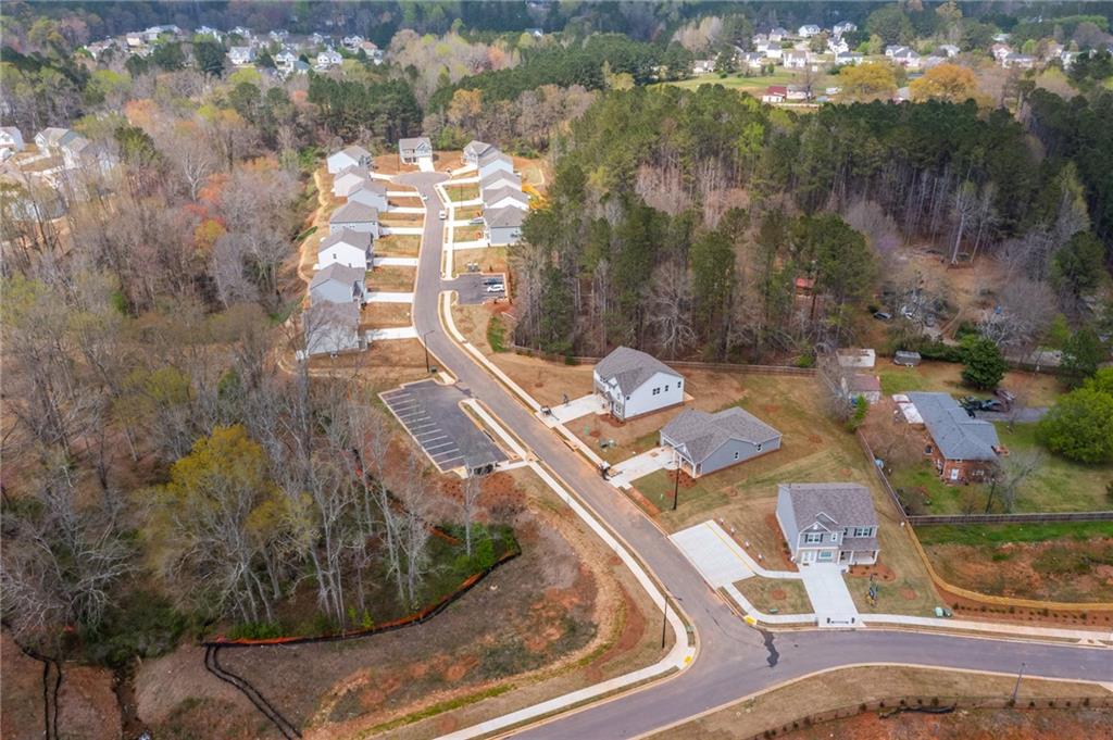 5370 Swan Lane Powder Springs, GA 30127 - Photo 48 of 54 a view of a house with a yard