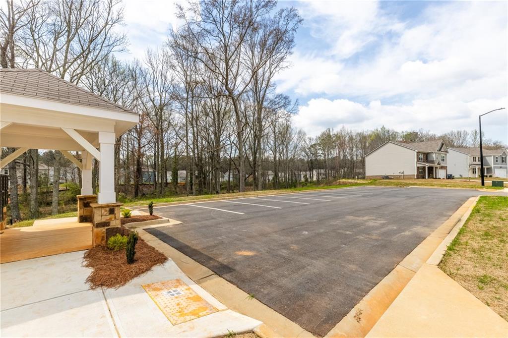 5370 Swan Lane Powder Springs, GA 30127 - Photo 54 of 54 a view of swimming pool with outdoor seating and city view
