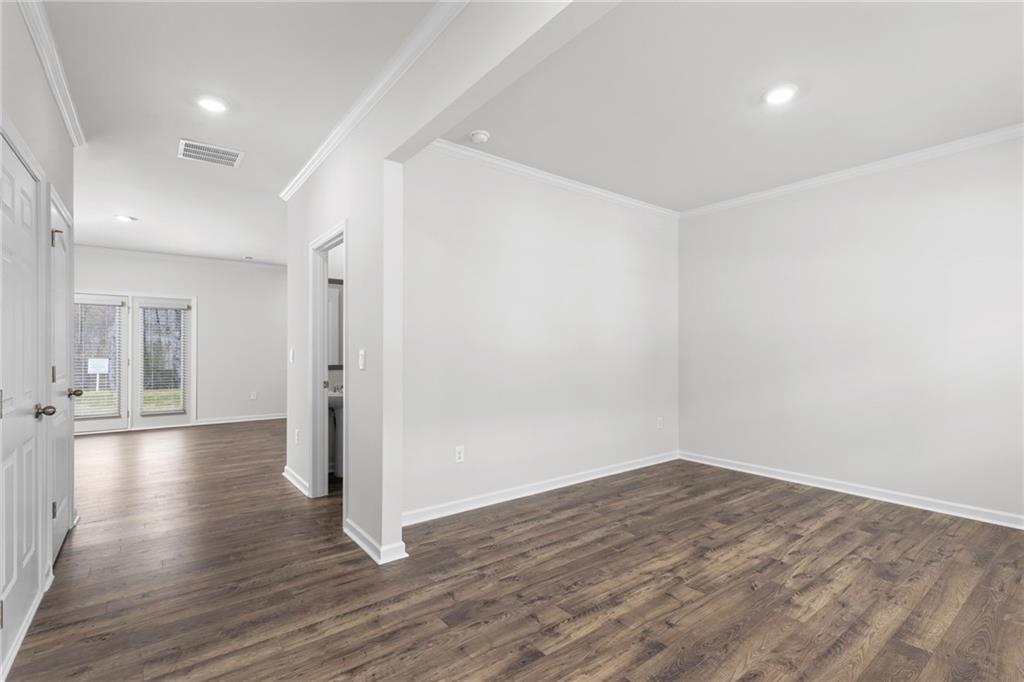 5370 Swan Lane Powder Springs, GA 30127 - Photo 7 of 54 a view of a room with wooden floor