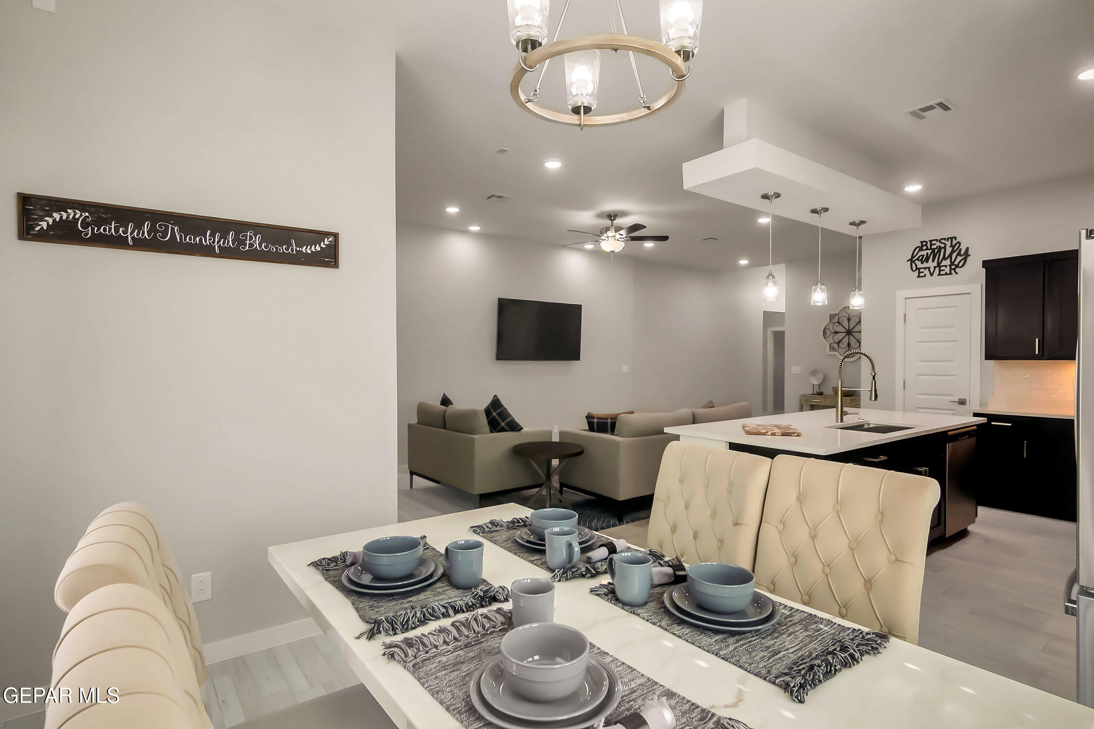3853 Object Place El Paso, TX 79938 - Photo 25 of 31 a living room with furniture and a flat screen tv