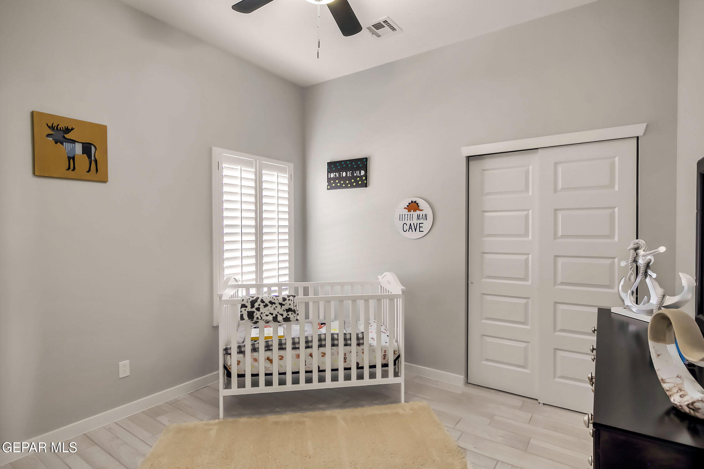 3853 Object Place El Paso, TX 79938 - Photo 26 of 31 a bedroom with a bed and a chair