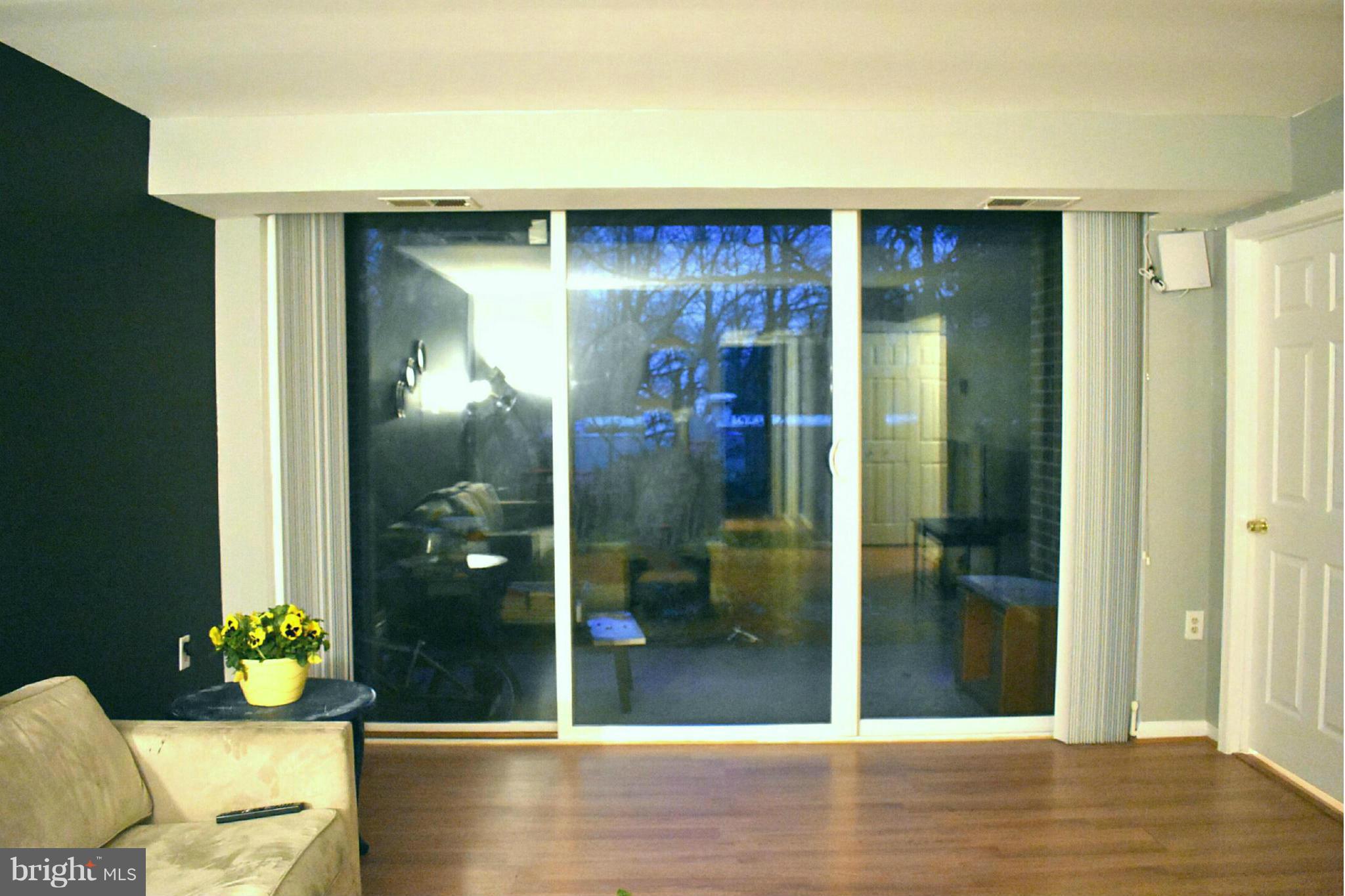 1401 Northgate Square, Unit 1A Reston, VA 20190 - Photo 15 of 26 lighted Living room