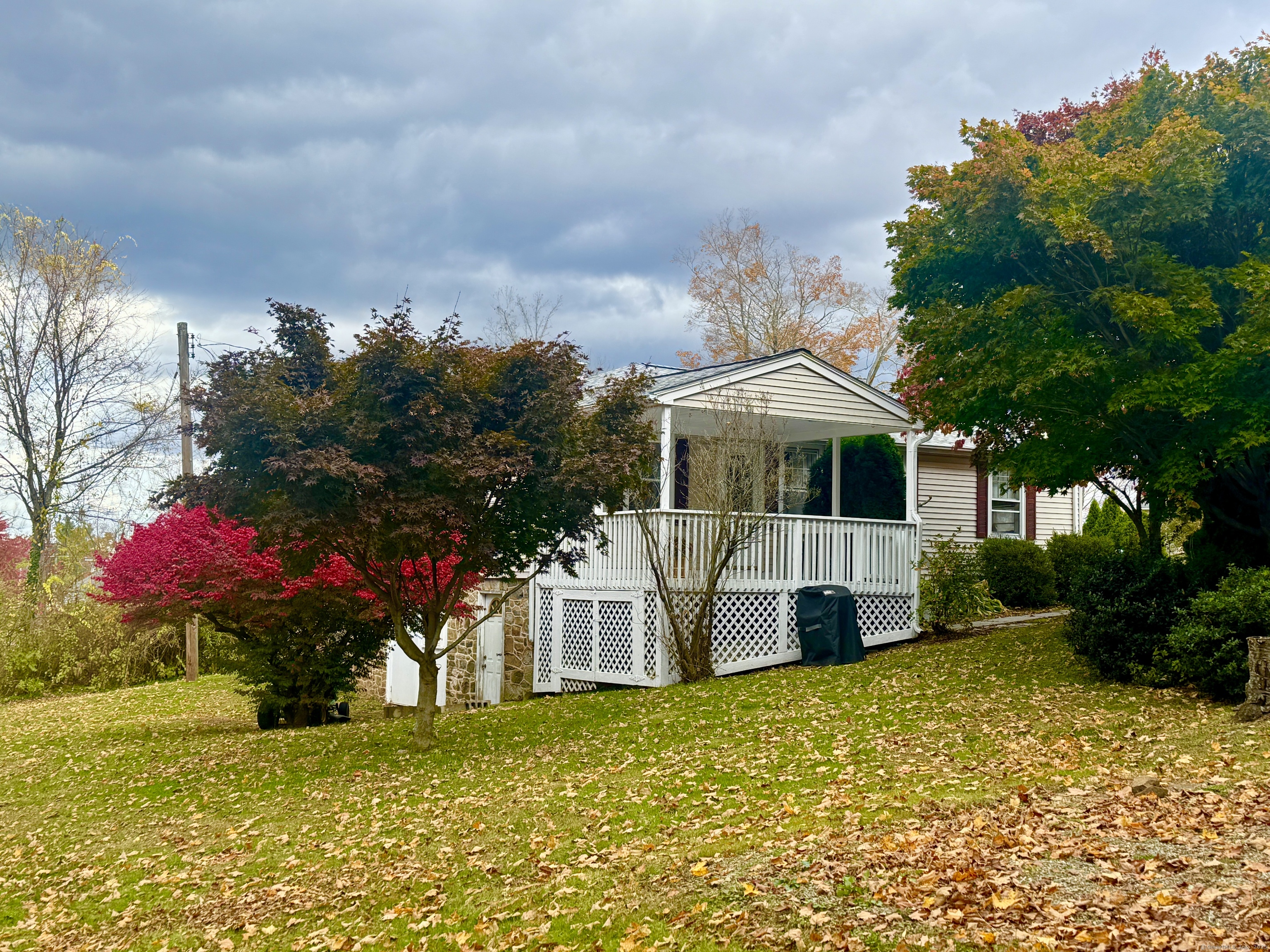 35 Madison Road Durham, CT 06422 - Photo 1 of 1 a front view of house with yard and trees in the background